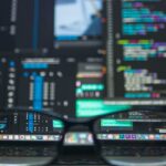 Web design news 2026 featured image showing designer workspace