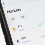 Cryptocurrency wallet app displayed on a smartphone screen showing Bitcoin balance
